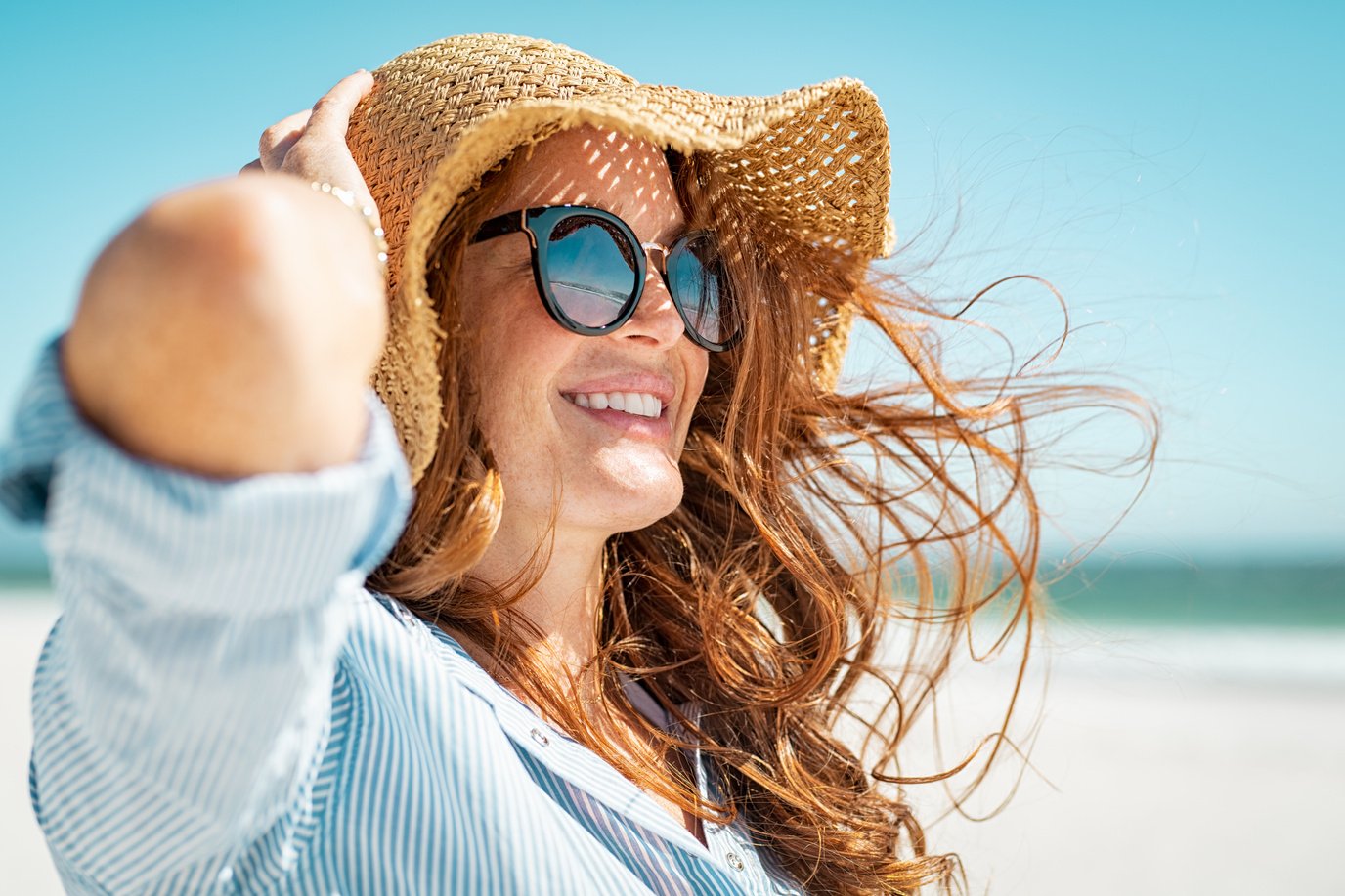 Happy Woman in the Beach